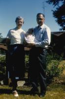 June, 1961. Doris (De Neff) Lowing (Mom) and Harold Crandal Lowing (Dad) with Jeanne Marie Brink.