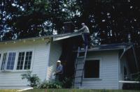 1962. Harold Crandal Lowing (Dad) and ? at cottage at Pickeral lake, Michigan.